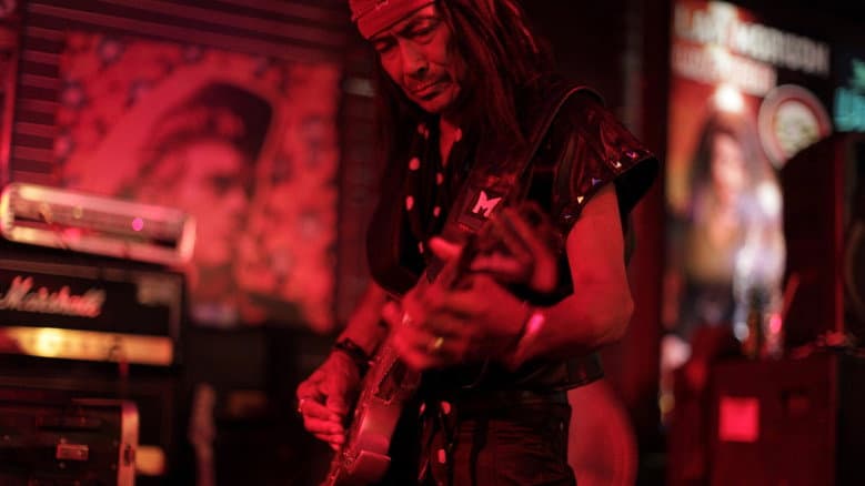 Backdrop from The Guitar King