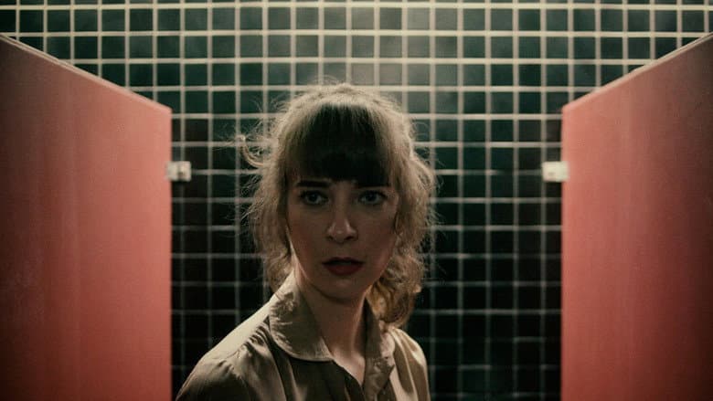 Backdrop from Woman in Stall