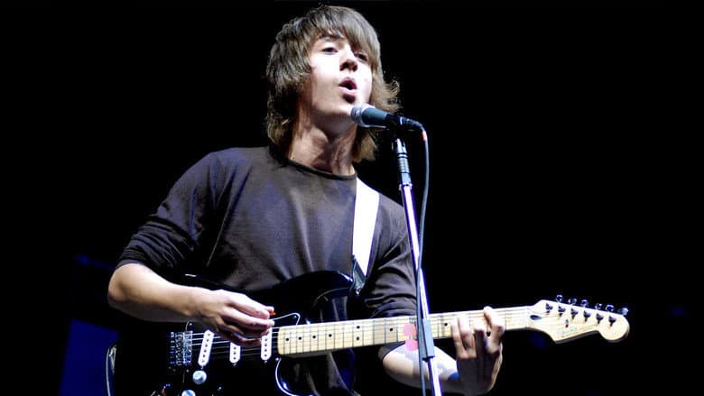 Backdrop from Arctic Monkeys: Behind the Music