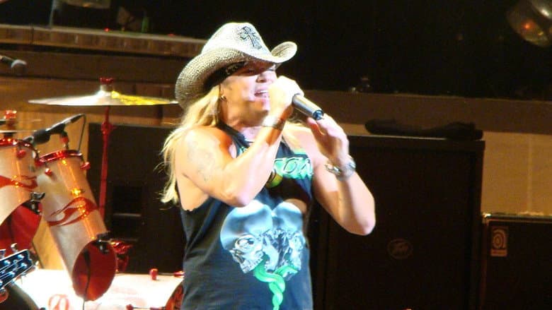 Backdrop from Poison: Live, Raw & Uncut