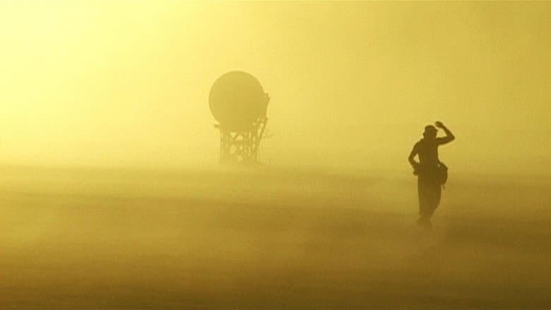 Backdrop from Desert: Who Is the Man?