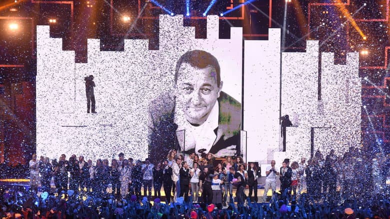 Backdrop from Les Enfoirés 2018 - Musique !