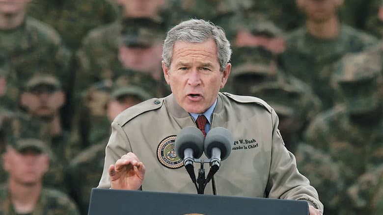 Backdrop from How to Sell A War: The George W. Bush Story