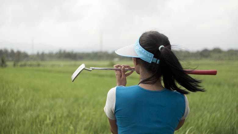 Backdrop from A Lady Caddy Who Never Saw a Hole in One